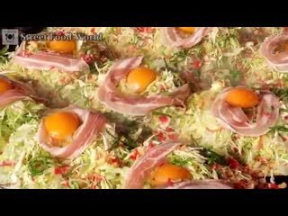 Japanese street food okonomiyaki seafood pancake japan