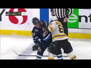 Brad marchand and nikolaj ehlers drop the gloves after big hit