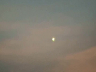 Ufo montana daytime sighting silver red green double spheres 7/27/2010