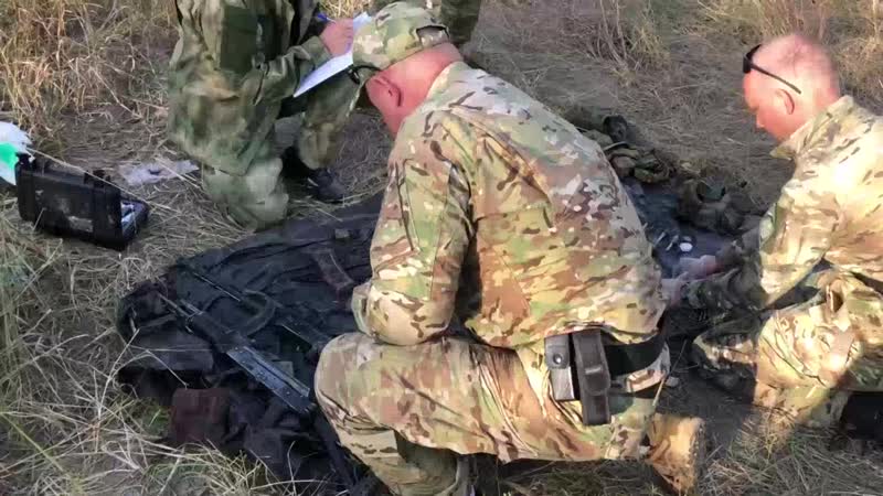 Кадры с места проведения операции,на записи видны автоматы, гранаты и значительное количество патронов