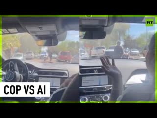 Police officer tries to pull over driverless car