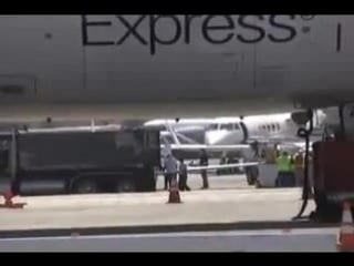 Angelina jolie gives shiloh and zahara a lift in her plane