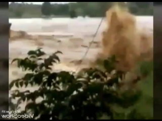 Bridge collapses under porn rains and flood