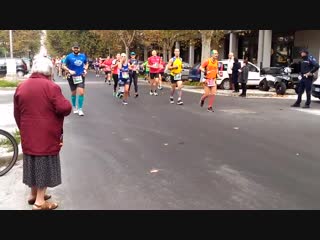 Grandma gives high fives at marathon