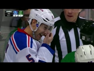 Gotta see it girardi gets puck wedged under visor