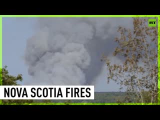 Nova scotia fire teams battle record breaking wildfire