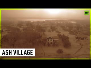 Volcanic eruption leaves village coated in ash