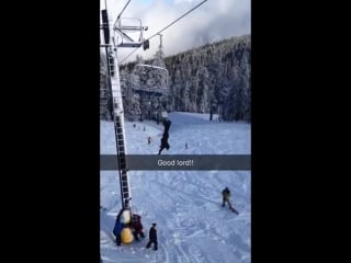 Snowboarder hanging upside down