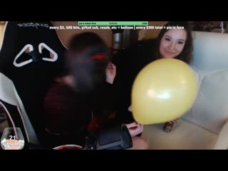 Streamer girls pinpop a balloon for jared