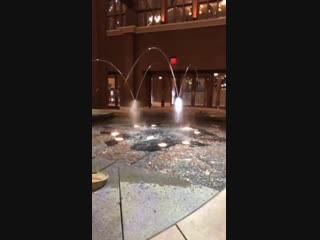 This fountain has spouts aimed at each other