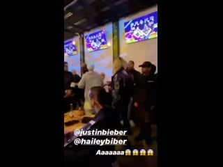 Hailey and justin bieber with pattie mallette, kennya and stephen baldwin at black star burger in los angeles, california