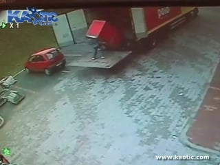 Man unloading a truck gets crushed by a giant red box