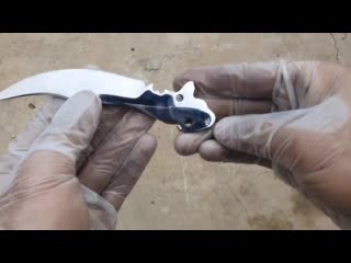 Turning a rusty bearing into a beautiful but razor sharp butterfly knife
