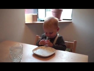 Drinking from a cup and peeling a banana