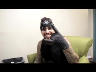 Fieldy arvizu getting tattooed and tattooing backstage in cincinnati, oh