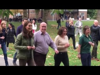 Kate meets locals as she takes a stroll through paddington recreati