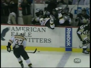 Arron asham hits milan lucic into the bench