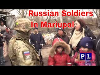 Russian soldiers evacuate porn from dangerous areas of mariupol