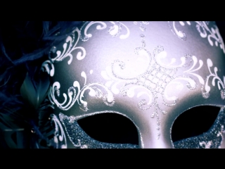 Close up tilting down shot of an elegant carnival mask