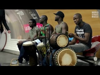 African djembe drummers in paris metro