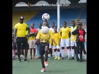 12 year old chinonso eche broke the guinness world record for most consecutive touches while balancing a ball on his head (111)