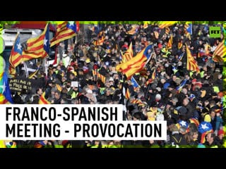 Thousands of catalans oppose spain france summit in barcelona