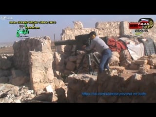 A syrian patriot gets a hit on an exposed assad crime dynasty tank, with a tow atgm