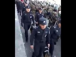 Chinese combatant military marching inside lhasa capital of tibet preparing for the anticipated march 10 uprising commemoration