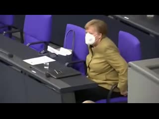 German chancellor angela merkel panics after forgetting her face mask