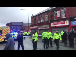 Police and ambulance in attendance at the albert pub next to anfield