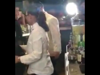 Nick jonas making drinks/behind the bar on november 17th 2017 at > in nassau, bahamas