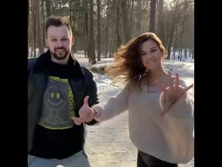 Ovidijus mikšys and miglė bachata dancing in snowy forest, kaunas litthuania