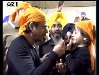 Shahrukh khan with son abram at the golden temple in amritsar