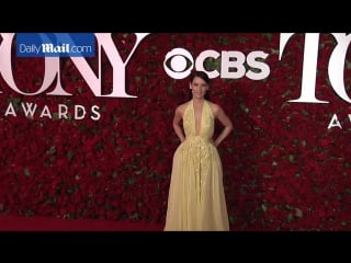 Lucy liu dazzles in plunging yellow gown at the tony awards