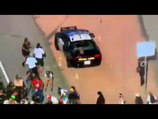 #los angeles blm rioting has erupted in los angeles a mob swarmed a police car