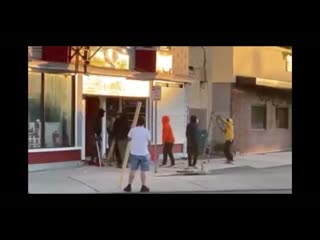 Commie looters porn old woman outside small business