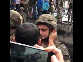 Soldier crying while carrying out orders to close the road to peaceful lebanese protesters