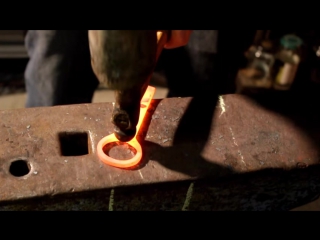 Blacksmithing hand forging a bottle opener