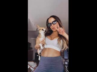 Slim brunette with sunglasses