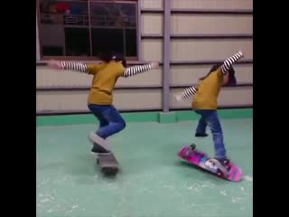 These skateboarding twins skate in perfect unison