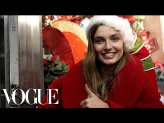 Model andreea diaconu plays santa on the streets of new york | vogue