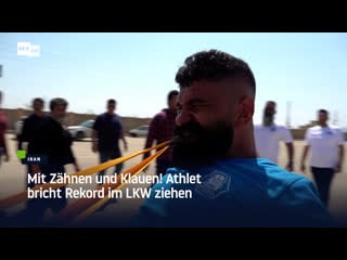 Mit zähnen und klauen! athlet bricht rekord im lkw ziehen