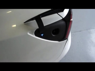 Tesla model 3 charge port by youtuber jurvetson