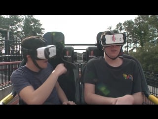 Dare devil dive virtual reality roller coaster pov new revolution six flags over georgia