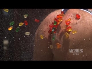 Hot girl shot in the butt with gummy bears slow motion