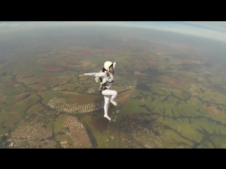 Skydiving wearing lingerie and hight heels