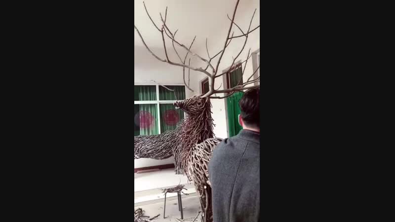 Christmas art built with branches and rattan