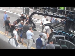 Anne hathaway catwoman and christopher nolan on set of the dark knight rises