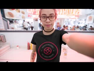 T shirt video of a woman taking a selfie in a cafeteria 17117 mp4