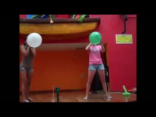 Balloon challenge drinking and blowing to pop in hot pants 1v1